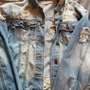 Distressed jean jacket
